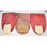 Three red canvas post or parcel bags with metal hanging loops and Post Office Bath to sides, one