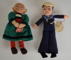 Norah Wellings 'Jolly Boy' sailor doll together with a French or Breton doll in traditional