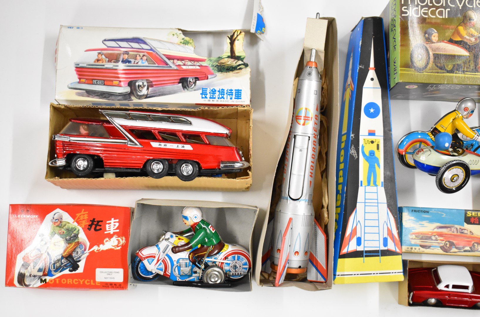 Seven tinplate clockwork toys, mostly Chinese and Russian, to include space rocket, double decker - Image 2 of 3