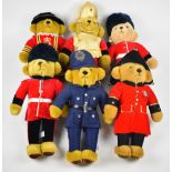 Six Merrythought Teddy bears including Policeman, Yeoman and Guardsman, height 40cm.