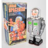 Battery operated plastic bodied 'Lunar Spaceman' robot by Mego, height 30cm, in original box.