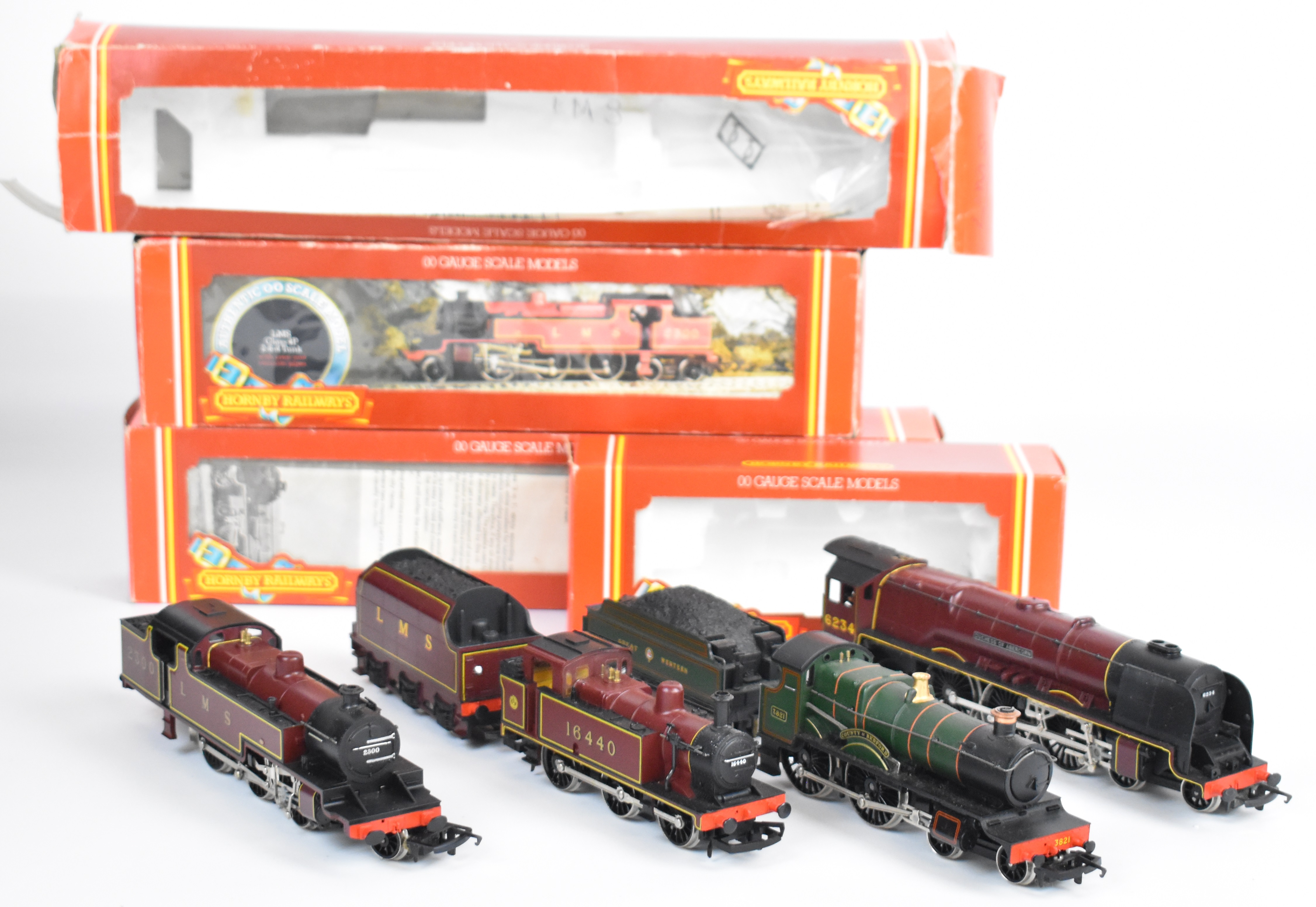 Four Hornby 00 gauge model railway locomotives to include GWR County Class 'County of Bedford' R.392