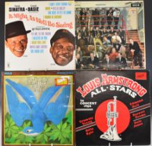 Twenty four Jazz albums including Johnny Keating & 27 Men, Louis Armstrong, Sonny Boy Williamson,