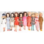 Ten vintage Sindy dolls by Pedigree dressed in original 1970's outfits.