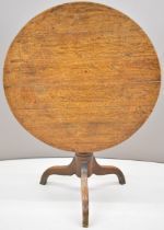 19thC oak circular tilt top table, height 73 x diameter 87cm