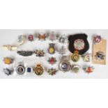 Collection of approximately 20 Fire and Ambulance badges including Lancashire County, South Wales,