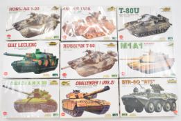 Nine Kitech World Famous Tank Series 1:48 scale motor driven plastic model kits to include Russian