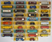 Thirty-eight Atlas N gauge American freight boxcars, all in original boxes.
