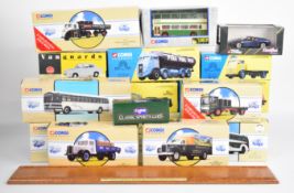 Eighteen mostly Corgi diecast model truck and buses to include General Motors Greyhound Lines 98602,