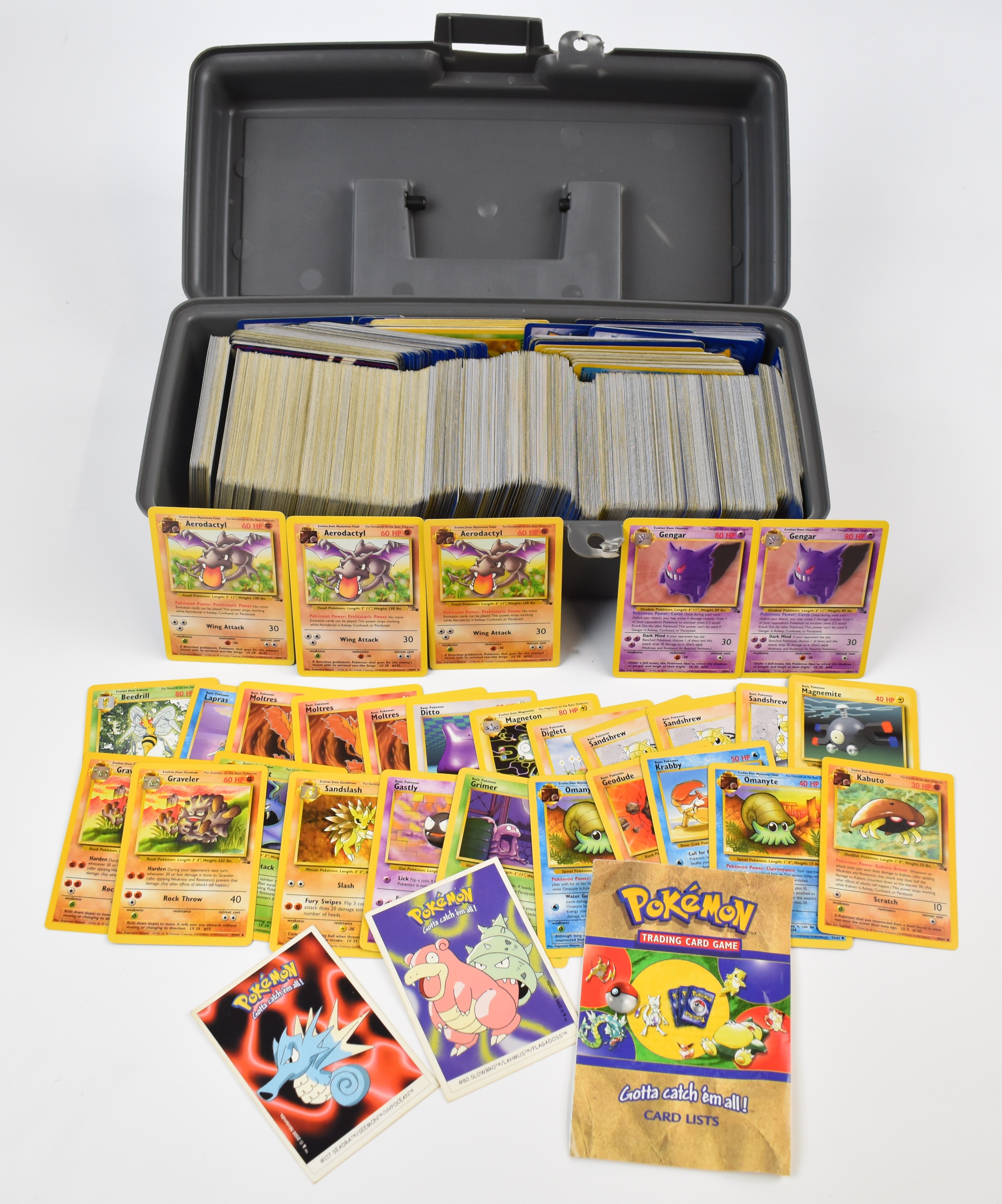 Approximately 700 Pokémon cards from Base, Jungle, Fossil, Base 2 and Rocket sets together with a