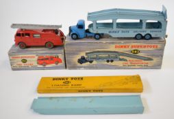 Two Dinky Toys diecast model trucks comprising Fire Engine with extending ladder 955 and Pullmore