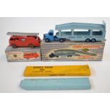 Two Dinky Toys diecast model trucks comprising Fire Engine with extending ladder 955 and Pullmore