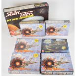Seven AMT Ertl Sci-Fi plastic model kits comprising five Star Wars X-Wing Fighter 8932, a Trade