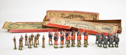 A collection of vintage Britains metal soldiers, with three original boxes.
