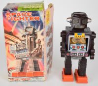 Japanese battery operated tinplate and plastic 'Space Fighter' robot by Horikawa (SH Japan),