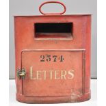 Tram car mounted metal letter box with handle to top and brass turn latch, overall height