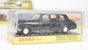 Two Dinky Toys diecast limousine style cars comprising Mercedes-Benz 600 128 and Rolls-Royce Phantom