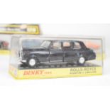 Two Dinky Toys diecast limousine style cars comprising Mercedes-Benz 600 128 and Rolls-Royce Phantom