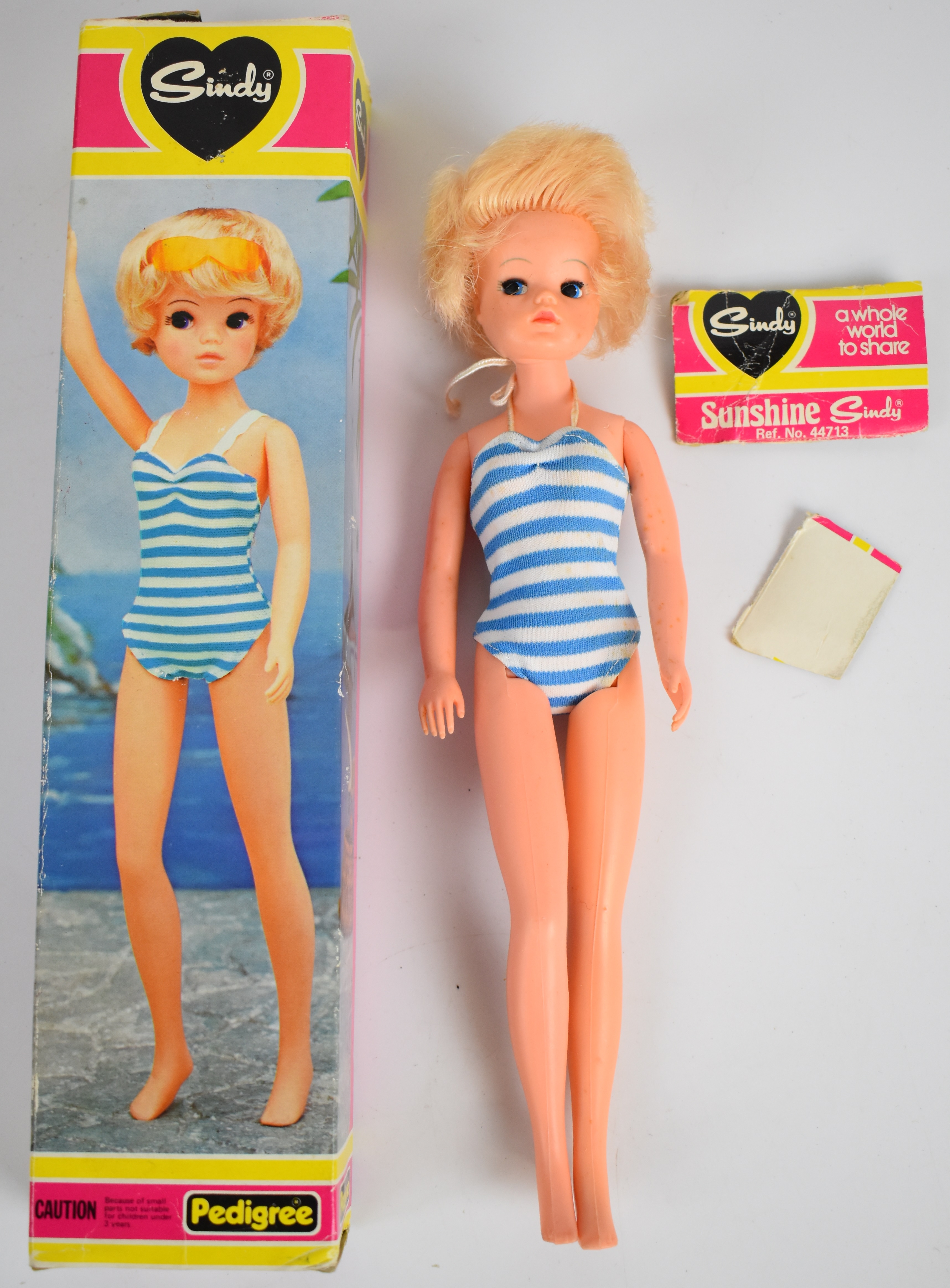 Pedigree Sunshine Sindy with short blonde hair and blue striped swimsuit, 44713, in original box.
