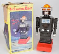 Japanese battery operated plastic body 'Laughing Robot' by Waco, height 35.5cm, in original box