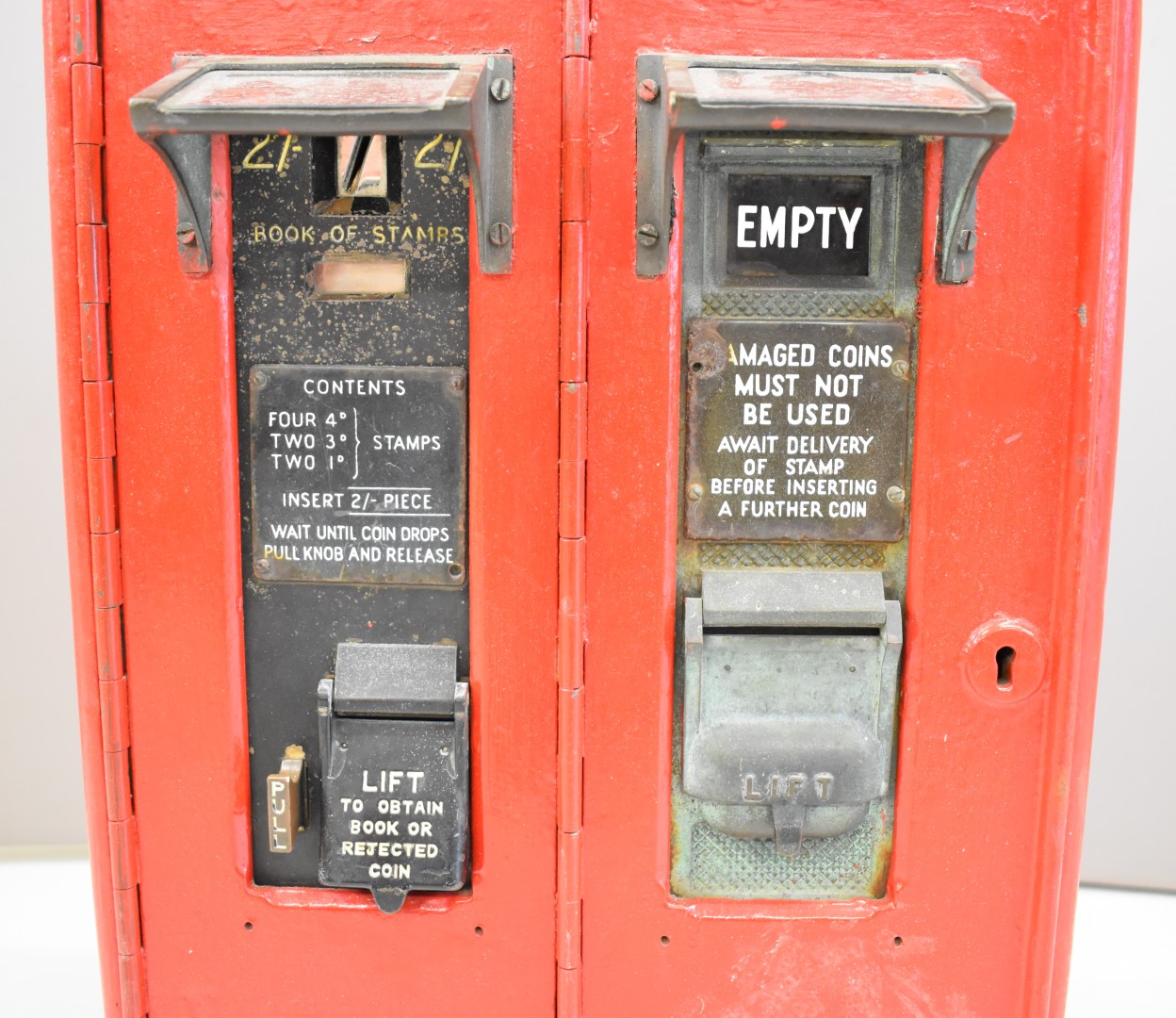 Cast iron postage stamps machine with two sections each housing a machine, overall height 64.5cm, - Image 5 of 7