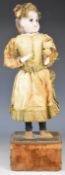19th century likely French Renou automaton model of a doll, with bisque or similar face and lower