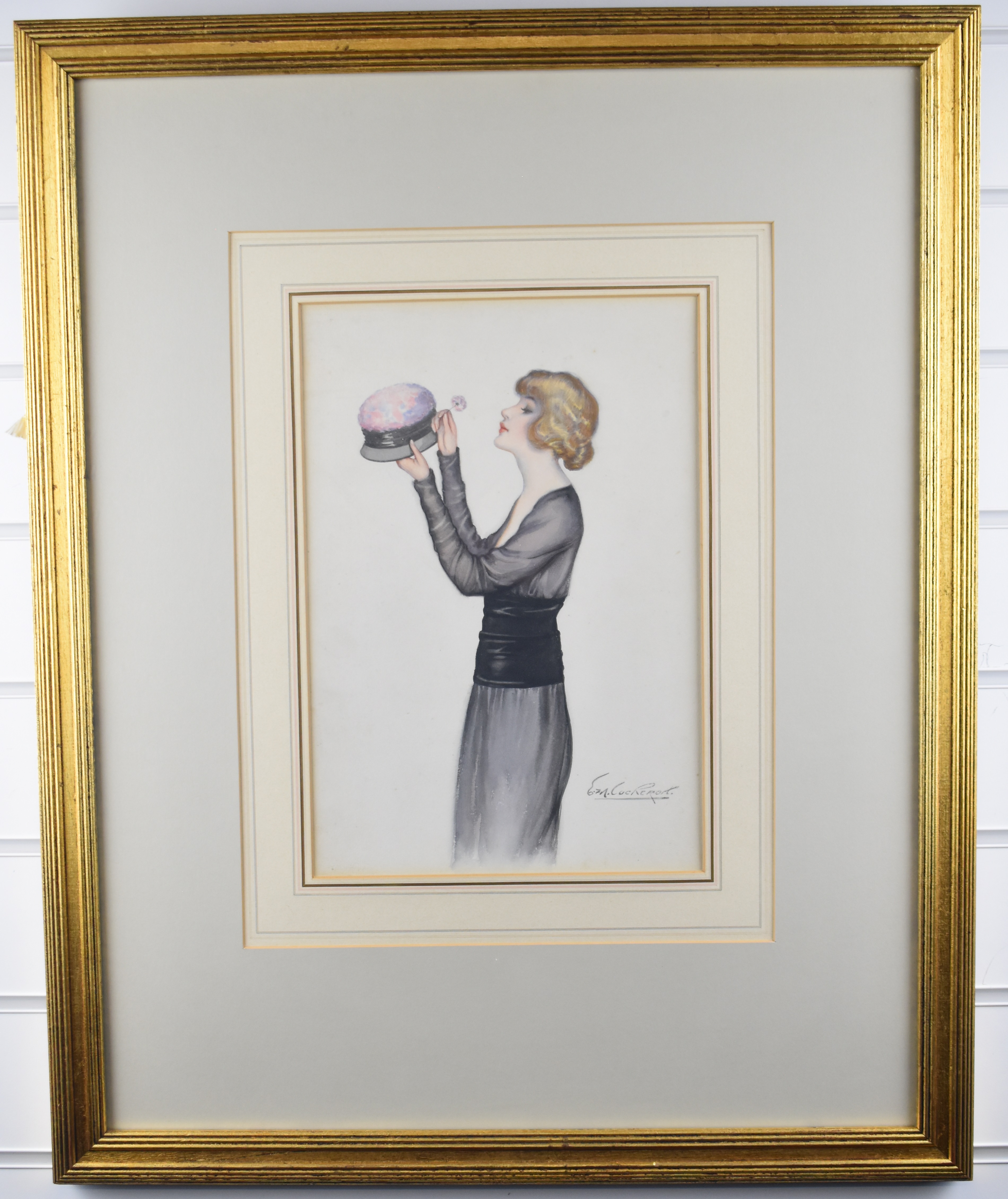 E. M. Cockroft (Postcard artist) Art Deco study of a lady adding a flower to her hat, signed lower - Image 2 of 5