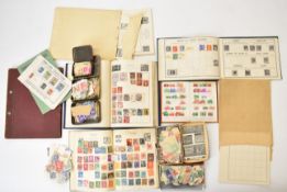 A stamp collection in various stamp albums including the Cardinal and The Royal Mail and in