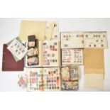 A stamp collection in various stamp albums including the Cardinal and The Royal Mail and in