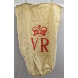 Victorian canvas post or parcel bag with metal hanging loops and VR cypher above crown, height