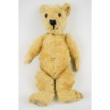 Vintage Teddy bear with golden mohair, disc joints, shaved snout and stitched features, height
