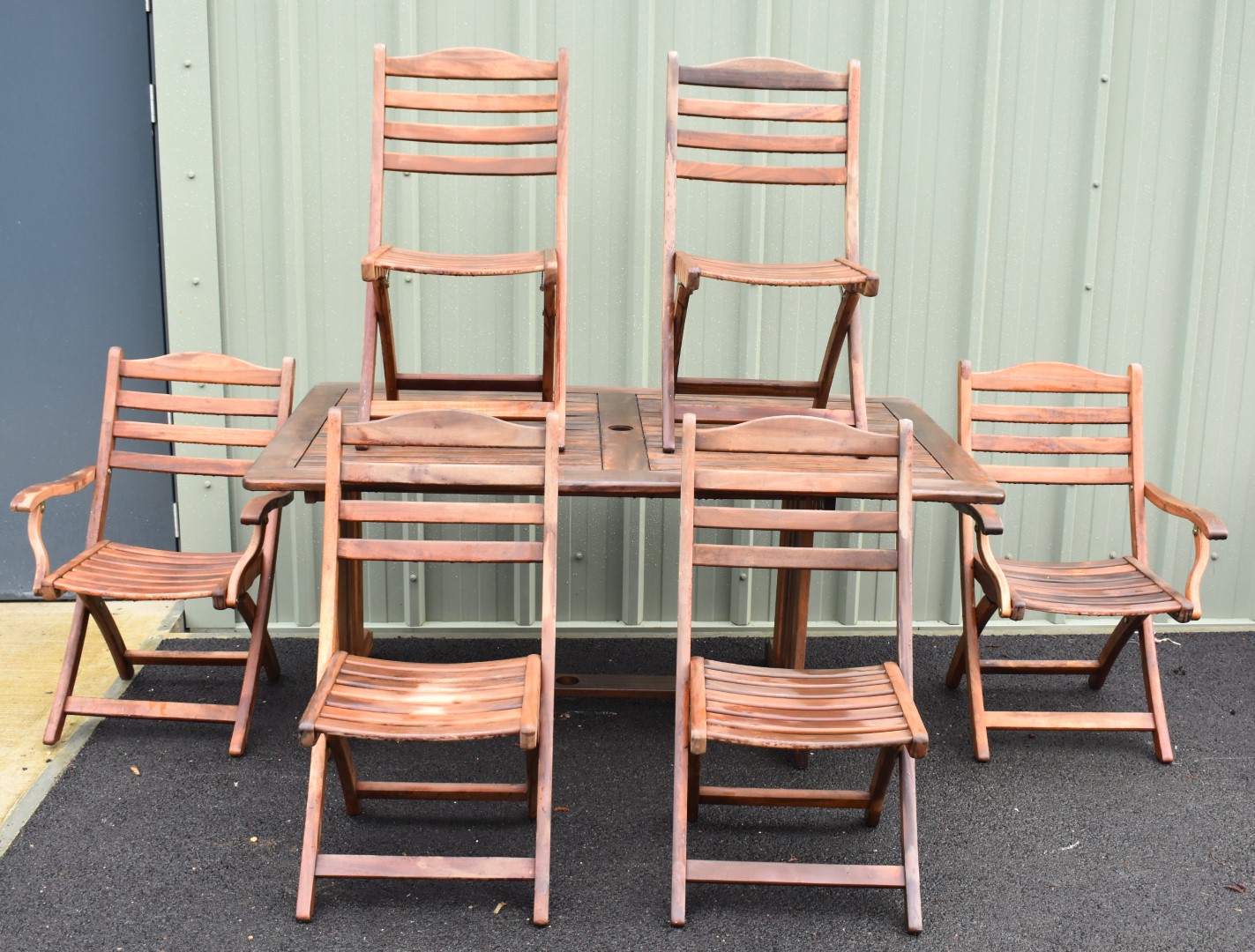 Teak garden table and six (2+4) folding chairs by Alexander Rose, table L165 x W100 x H72cm