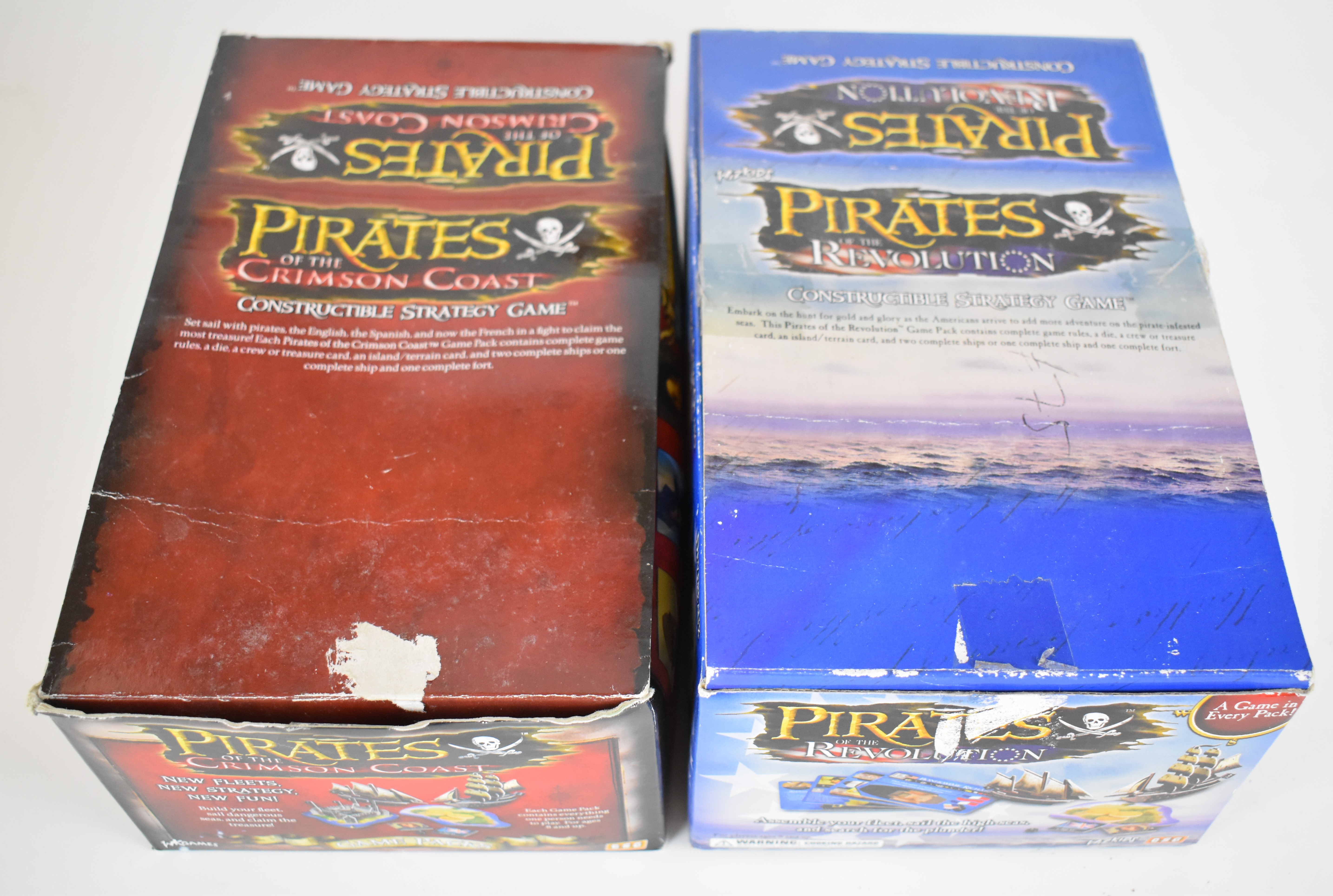 A box of WK Games / Wiz Kidz Pirates of the Revolution constructible strategy gaming cards