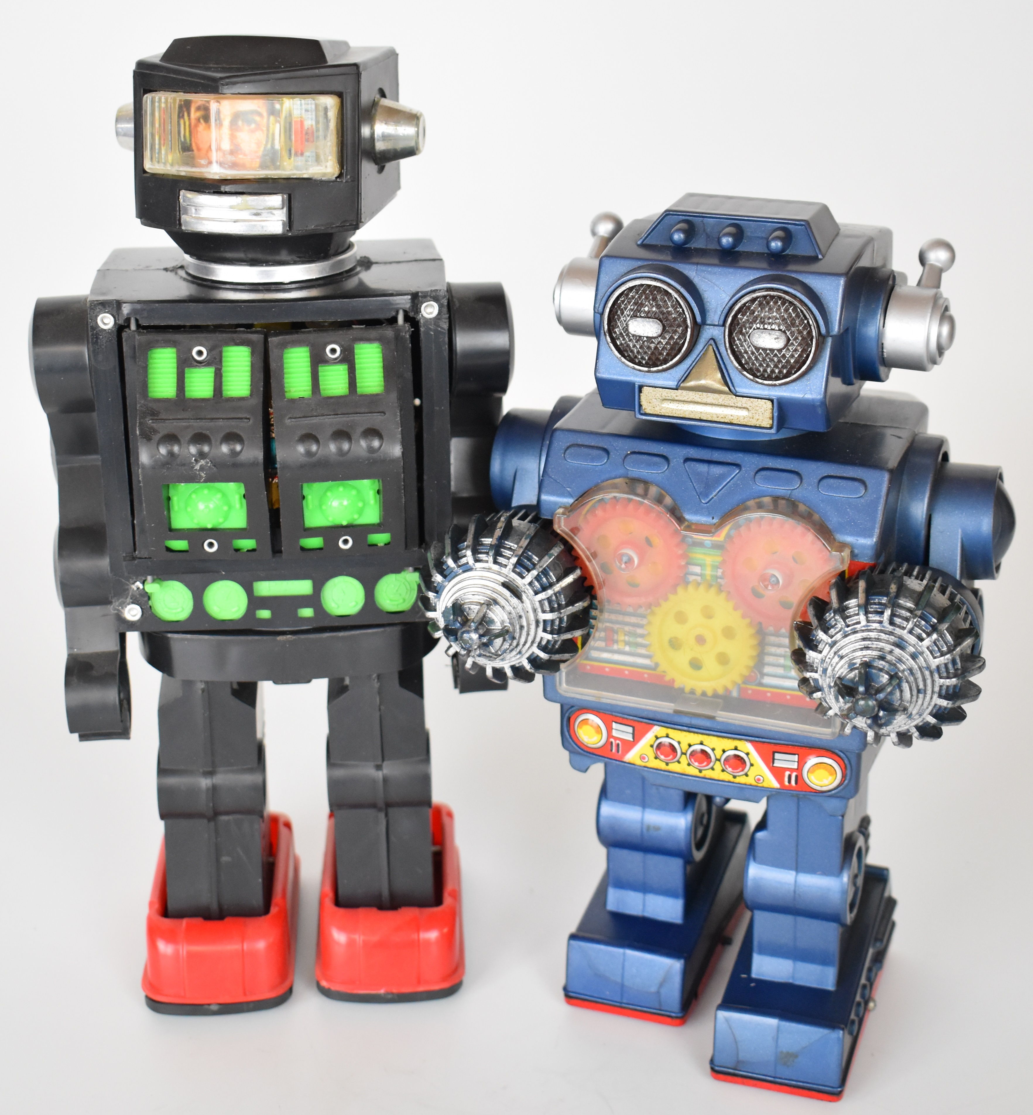 Eight battery operated toy robots, tallest 30cm. - Image 2 of 3