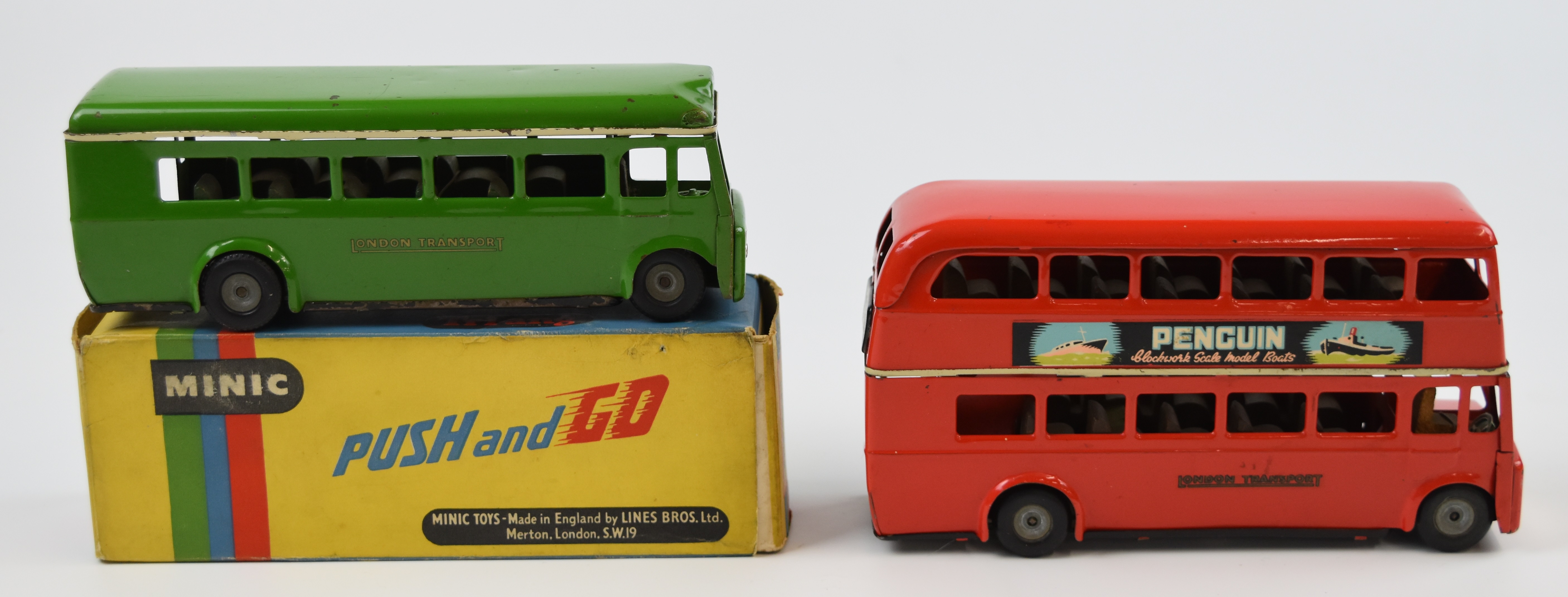 Two Tri-ang Minic Push and Go tinplate or pressed steel model buses comprising a London Transport - Image 2 of 3