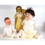 Three Armand Marseille bisque headed dolls with weighted eyes, articulated limbs, painted features