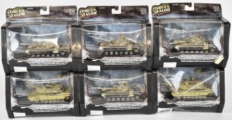 Six Unimax Forces of Valour 1:72 scale diecast model tanks to include U.S. M1A2 Abrams and Iraqi T-