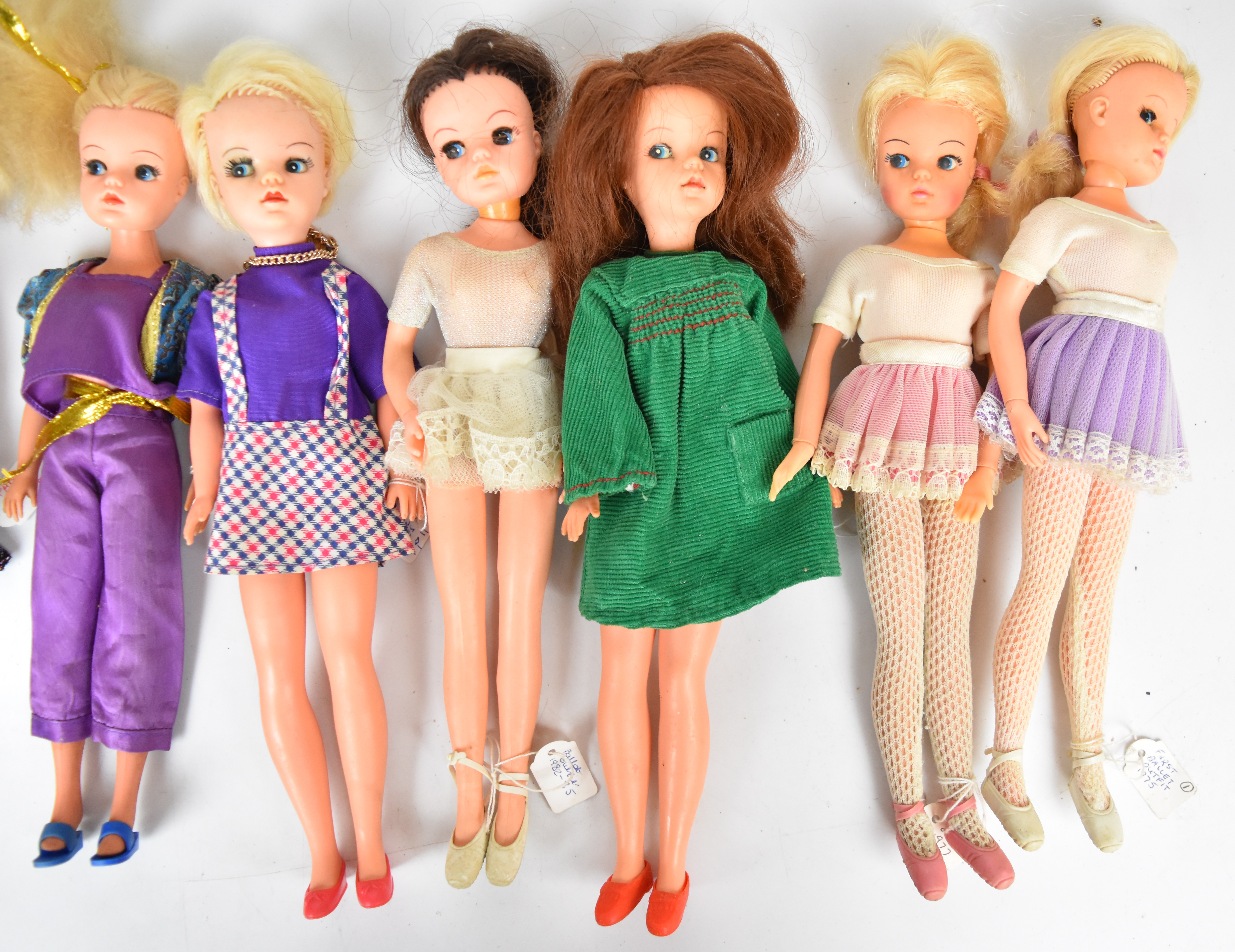 Ten vintage Sindy dolls by Pedigree dressed in clothing ranging from the 1960's to 80's. - Image 2 of 4