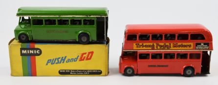 Two Tri-ang Minic Push and Go tinplate or pressed steel model buses comprising a London Transport