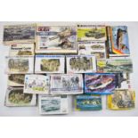 Twenty-three mostly World War 2 themed plastic model kits, manufacturers include Monogram, Dragon,