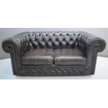 Brown leather Chesterfield two seater sofa, width 160 x height 70cm