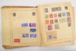 The Strand stamp album containing world stamps, including SA triangle, China coiling dragons, etc