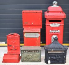 Seven various modern novelty and similar post boxes including fibreglass and steel examples,
