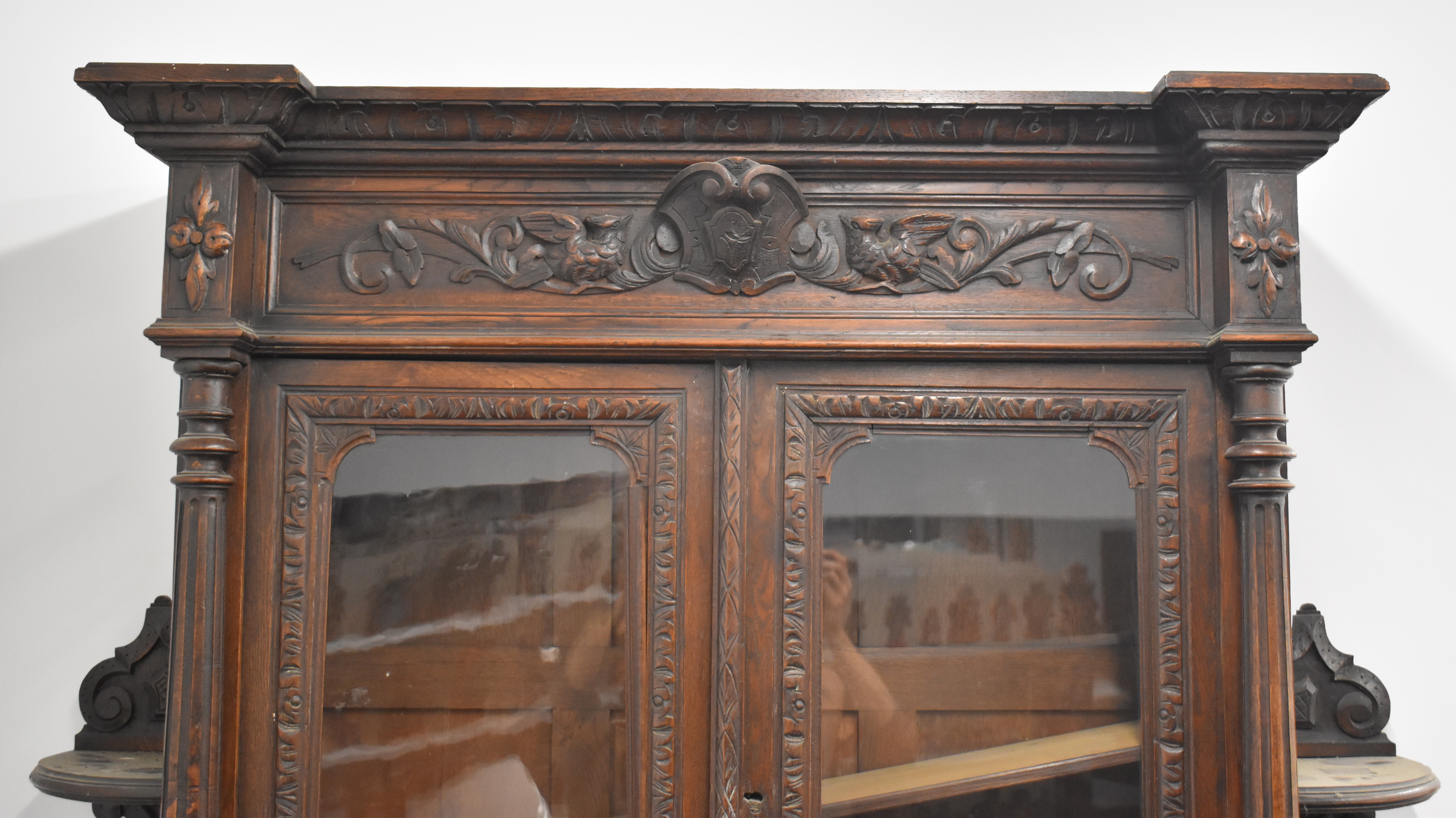 Victorian breakfront carved oak glazed bookcase over two drawers and twin cupboard with hunting - Image 4 of 8