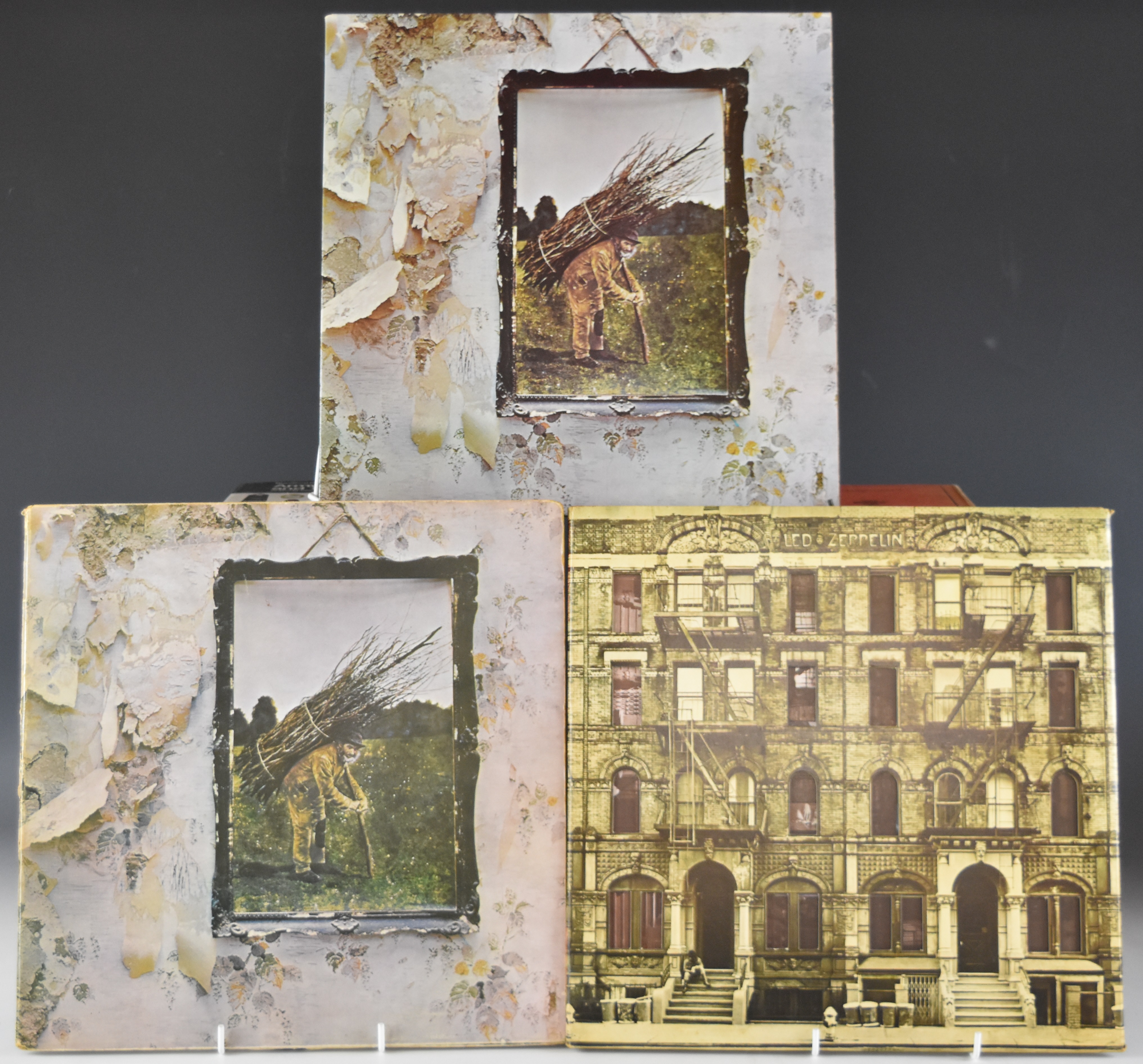 Three Led Zeppelin albums comprising Physical Graffiti double album with cut out cover and two