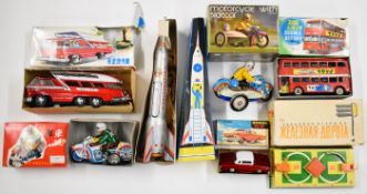 Seven tinplate clockwork toys, mostly Chinese and Russian, to include space rocket, double decker