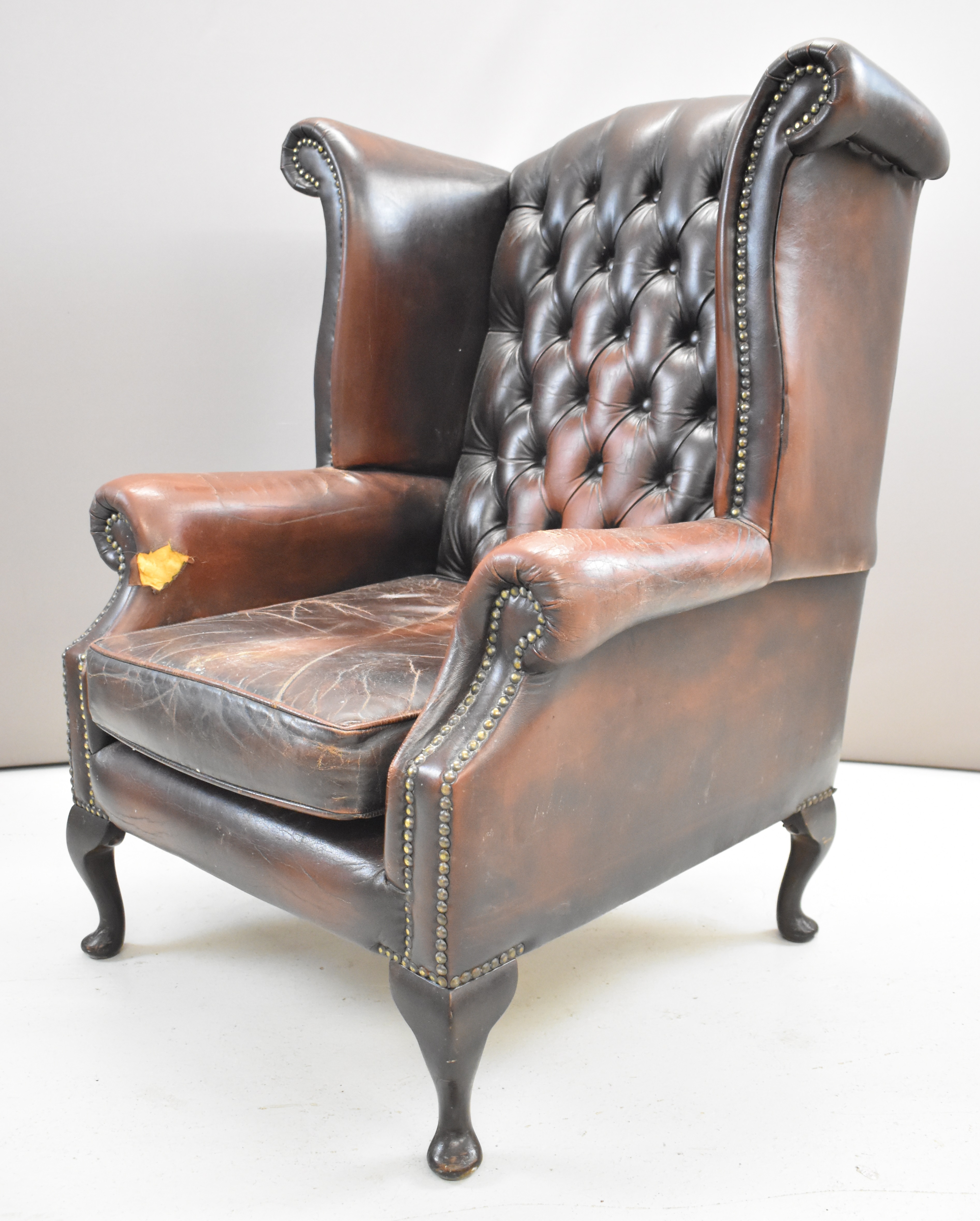 Brown leather Chesterfield wing back armchair raised on cabriole legs, height 105cm - Image 3 of 5