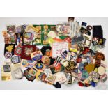 Large collection of cloth badges including sports, county and visitor attractions, Girl Guides,