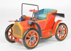 Tinplate lever driven car by Modern Toys / Masudaya, made in Japan.