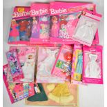 A collection of Barbie clothing and accessory sets by Mattel, all in original packaging.